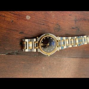 Vintage Gucci gold/silver/diamond watch